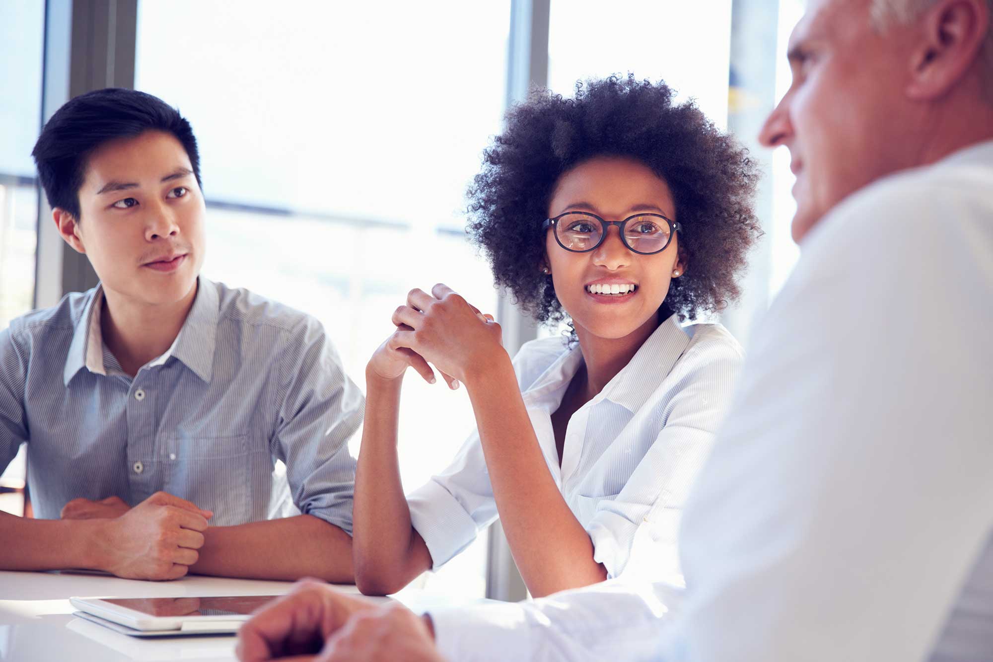 three-business-professionals-working-together-resized Creating High Performing Teams